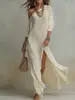 Vestido de punto plisado con abertura de manga larga elegante e independiente transfronterizo europeo y americano de verano 2026