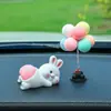 Adornos para coche en línea rojo caricatura lindo Q juego trasero muñeca consola central del coche juguete de descompresión decoraciones de animales