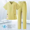 Conjunto de dos piezas de uniforme de enfermera de hospital dental modelo nuevo hecho a medida, unisex de manga corta y pantalón largo con cuello en V, ropa de trabajo