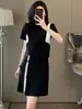 Traje Casual de Moda Estilo Coreano para Mujer 2026 Verano Personalidad Única Patchwork Camiseta de Manga Corta Faldita Adelgazante Conjunto de Dos Piezas Tendencia