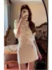 Conjunto de Dos Piezas Estilo Coreano y Japonés para Mujer, Primavera y Otoño 2026: Conjunto de Top de Punto y Falda a la Moda y Elegante
