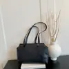 Otoño 2026 Nuevo Estilo Coreano Moderno Sencillo Bolso de Axila Color Sólido Bolso de Hombro para Viajes Cotidianos Bolso de Mano Vintage