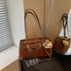 Bolsa de ombro versátil para mulheres, de alta qualidade, nova bolsa simples estilo coreano para o dia a dia, 2026