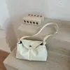 Nova bolsa de ombro lisa 2026, simples e estilosa, com um design único e moderno, alto apelo estético, adequada para o trabalho e uma bolsa de mão da moda para quem prefere um estilo mais discreto.