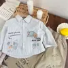 Camisa de Manga Comprida Infantil 2026 Nova Primavera Gola Cartoon Top para Meninos e Meninas, Camisa Listrada Vertical para Crianças Pequenas
