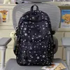 Mochila linda de niña con estrellas estampadas por todas partes, adecuada para estudiantes de secundaria y preparatoria, elegante y ligera