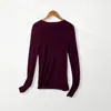 Nuevo modelo de principios de otoño, 60 hilos, lana pura transpirable, cuello redondo, manga larga, camiseta de punto básica para mujer, cómoda, ajustada, versátil