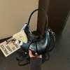 Bolsa Transversal Feminina 2026 Verão Nova Moda Laço Bolsa Bolinho Versão Coreana Nicho Bolsa de Mão Simples Bolsa de Ombro