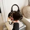 Bolso de Mano Simple y de Alta Gama Estilo Nuevo para Mujer Primavera 2026 Cuero Vintage con Cera de Aceite Bolso Bowling Elegante Bolso Cruzado