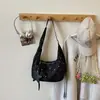 Bolsa Dumpling Simples e Moderna 2026 Verão Nova Moda Feminina para o Dia a Dia Transversal Casual Personalidade Bolsa de Ombro para Mulheres