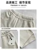 Pantalones Deportivos Blancos de Arena Fluida con Hoja Curva para Mujer Otoño 2026 Nuevos Perezosos de Cintura Alta Adelgazantes Petite Casual Pierna Ancha Pantalones de Chándal
