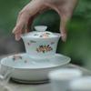 Cuenco Cubierto Ercai Tallado en Barro de Jade Pintado a Mano con Flores Pequeñas de Pie Alto Set de Té Kung Fu No Caliente Cuenco de Té de Cuerpo Delgado Color Bajo Esmalte