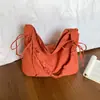 Bolsa feminina de grande capacidade para uso transfronteiriço, nova coleção outono 2026, bolsa de ombro versátil e elegante, bolsa tote moderna e casual para o trabalho e uso diário