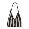 Bolsa Tote Listrada Colorida de Contraste Nova para o Verão de 2025 Feminina para Trabalho e Deslocamento Grande Capacidade Bolsa de Ombro Moda Bolsa de Axila