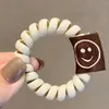Corea del Sur Color Tierra Té de Leche Línea Telefónica Anillo para el Cabello Anillo de Tela Sonriente Cuerda para el Cabello sin Marcas Cubierta Pequeña de Cuero Accesorios para el Cabello