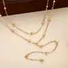 Collar de Borla Multicapa Simple de Venta Caliente Transfronterizo Europeo y Americano para Mujer, Cadena para Clavícula de Bola Versátil y de Moda