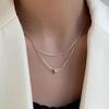 Colar de corrente de osso de cobra com contas de camada dupla para mulheres, moderno e simples, com um design de nicho, corrente de clavícula elegante estilo ins