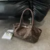 Bolsa de ombro plissada retrô com estampa de leopardo para mulheres, nova coleção outono 2026, bolsa de mão de moda nicho, bolsa de ombro para o dia a dia