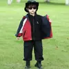 Conjunto de dos piezas para niño de primavera y otoño: Cortavientos de cuerda tejida con bloques de color, prenda exterior elegante y moderna para niños pequeños, top infantil, calidad de exportación
