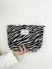 Bolsa de cosméticos con estampado de leopardo de Amazon, gruesa, para guardar, lavar y viajar, práctica bolsa de cosméticos de mano.
