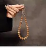 Cadena de Teléfono de Cuentas Ámbar Agrietadas de Moda Lanyard Corto Hecho a Mano de Alta Gama Accesorio para Bolso Venta al por Mayor