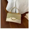 Bolso de Mano para Mujer Verano 2025 Nuevo Bolso Cuadrado Pequeño Transfronterizo con Acabado de Alta Gama, Bolso Cruzado Versátil, Bolso Pequeño de Moda