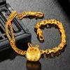 Tienda de oro con el mismo estilo de superficie de animal de oro arena, pez de madera, pulsera guardián de la paz, nueva joyería de marea nacional china para regalo de novia