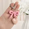 Bolsa Versátil de Alta Qualidade com Laço Vermelho Coração Rosa e Pingente de Chave Corrente de Chaveiro Coração Dongdaemun Coreia do Sul