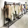 Expositor de isla para tienda de ropa, soporte de pared lateral para colgar ropa, combinación de expositores, estanterías para ropa de hombre y mujer, perchero interior para colgar ropa