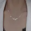 Collar de flores ligero de lujo estilo japonés y coreano para mujer, diseño de nicho, estilo dulce, simple, elegante y frío, cadena de clavícula de acero de titanio.
