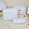 Bolsa de maquillaje floral azul fresca transfronteriza, bolsa de tocador de viaje portátil de gran capacidad, bolsa de almacenamiento de cosméticos estilo ins