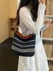 Bolso casual transfronterizo de gran capacidad para mujer, nuevo modelo 2026 bolso cruzado, bolso tipo cubo versátil para hombro para estudiantes universitarios y para ir al trabajo