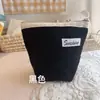 Bolsa de almacenamiento de cosméticos de pana lisa bolsa de almacenamiento de viaje bolsa de almacenamiento diario bolsa de cosméticos simple venta al por mayor de fábrica