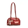 Bolsa de ombro popular deste ano para mulheres 2024 inverno nova bolsa de mão com laço de pérolas bolsa de ombro vintage para o dia a dia