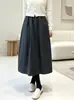 Saia em botão tridimensional estilo Hepburn original! Tecido de lã europeu outono e inverno saia longa elegante