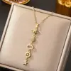 Collar de acero de titanio con colgante de planeta y estrella de borla exquisita tachonada de diamantes transfronterizo para mujer, joyería de cadena para la clavícula de moda y de alta gama