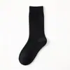 Calcetines de Lana para Mujer Otoño e Invierno de Media Pantorrilla Calcetines Gruesos Forrados de Felpa Cálidos de Invierno Calcetines de Cachemira Montones de Medias Industria de Calcetines de Zhuji