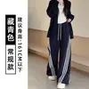 Pantalones de chándal negros de moda de este año para mujer, con tres rayas curvas y pierna ancha, novedad otoño 2026, holgados y estilizados