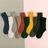 Calcetines de color sólido de comercio electrónico transfronterizo, venta al por mayor de invierno, calcetines altos de tubo gruesos y cálidos para mujer, calcetines de comercio exterior