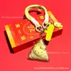 Chaveiro Criativo Zongzi HelloKitty Desenho Animado Fofo Gato KT Zongzi Pingente Dourado Festival do Barco-Dragão Presente Venda por Atacado