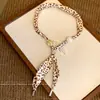 Collar con Bufanda de Seda y Cuentas Estampado Leopardo Retro Diseño de Nicho para Mujer Cadena de Suéter Accesorios de Collar Elegantes Versátiles Nuevo Estilo 2025