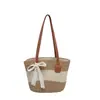 Bolso cubo de moda y fresco transfronterizo para mujer, nueva colección otoño 2026, bolso de hombro tejido color block, bolso versátil para el antebrazo