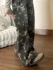 Marca Koi da moda, com estampa integral de estrelas, nova coleção outono/inverno feminina, calça estilosa de corte reto e perna larga, caimento solto, design de perna curva