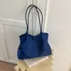 Bolsa tote de nylon estilo coreano, nicho, para mulheres, grande capacidade, novo design 2026, bolsa tipo balde leve, adequada para o dia a dia, bolsa de ombro feminina