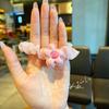 Nuevo anillo de dopamina para intestino delgado con diseño de flor de color caramelo, accesorio para el cabello tridimensional para estudiantes, linda banda de goma con forma de corazón para niña.