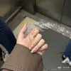 2026 Novo Estilo Unhas Portáteis Espelho Céu Luxo Leve Nude Aurora Rosa Desejo Puro Branqueamento Simples Adesivos de Unha Atacado
