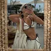 Bikini de tres piezas con bloques de color blanco y negro 2026 Nuevo Europeo y Americano Traje de baño Sexy Comercio Transfronterizo Venta al por mayor al por mayor