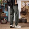 Pantalones de senderismo casuales para hombre, estilo japonés triangular transfronterizo, tendencia primavera/otoño 2026, softshell suave, multibolsillos