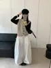 Nova coleção outono e inverno: colete estilo retrô, de corte solto e versátil para mulheres, com decote redondo, adequado para o trabalho, com um design de cardigã de tricô chique e elegante, e um verso simples de cor sólida