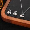 Widney Spring Nuevo Traje de Collar y Aretes de Durazno Yin de Alta Gama Aretes de Tuerca Cadena de Clavícula de Lujo Ligero para Mujer